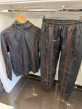 Nike NOCTA Windbreaker Tracksuit – Σετ Αντιανεμικής Φόρμας Μαύρο/Πορτοκαλί